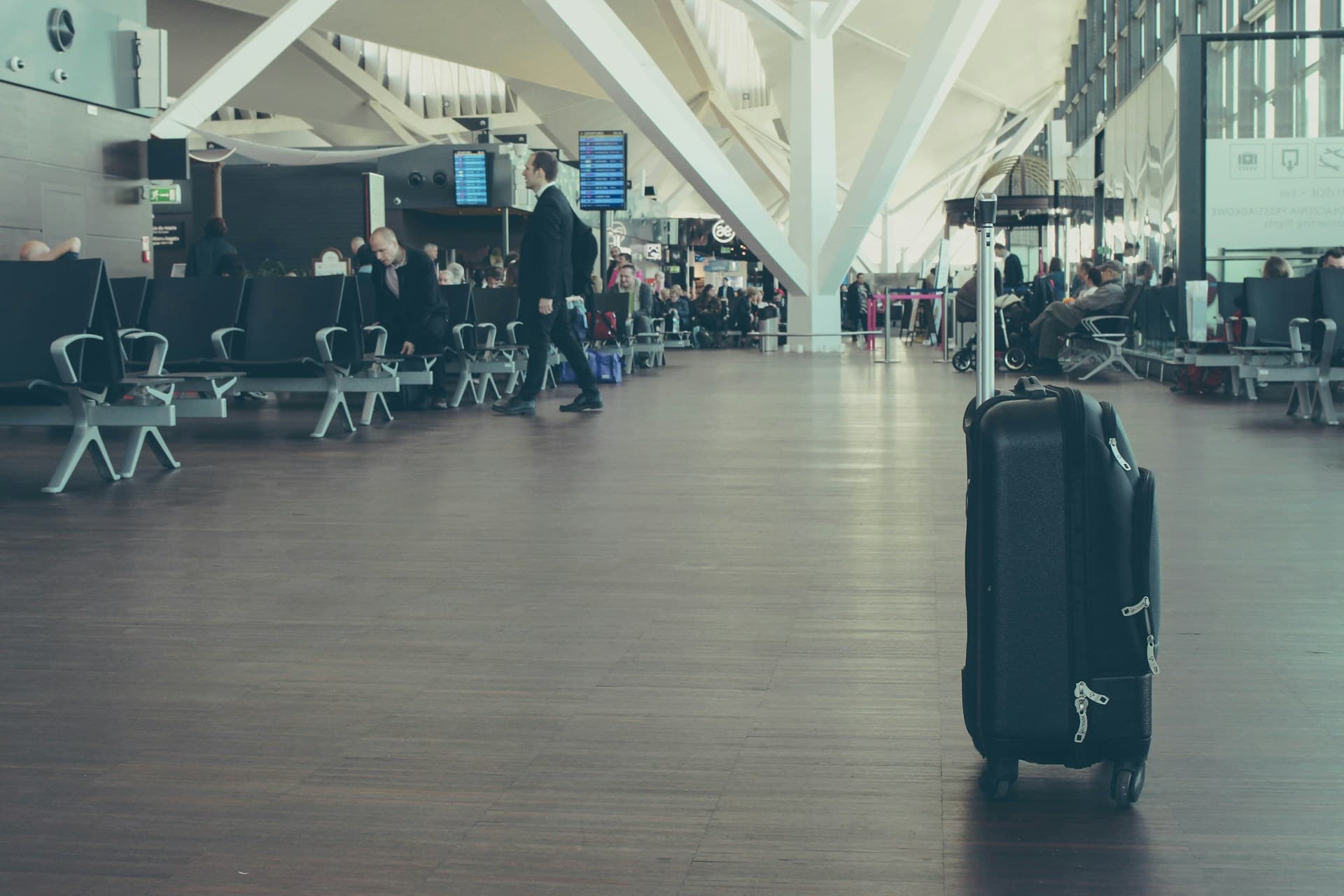 Airport baggage counter showing prepaid and counter pricing comparison